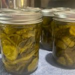 Bread & butter pickles canned and in mason jars.