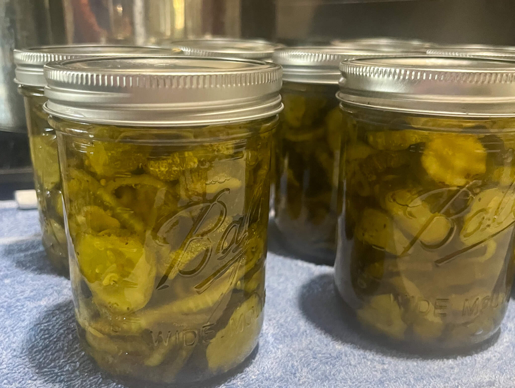 Bread & butter pickles canned and in mason jars.